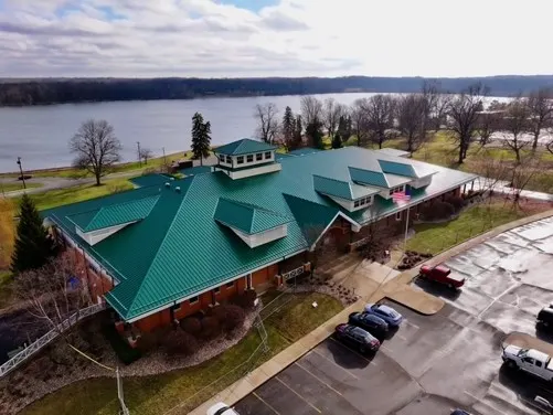 Tarping and dry-in on a Coverdale commercial roof